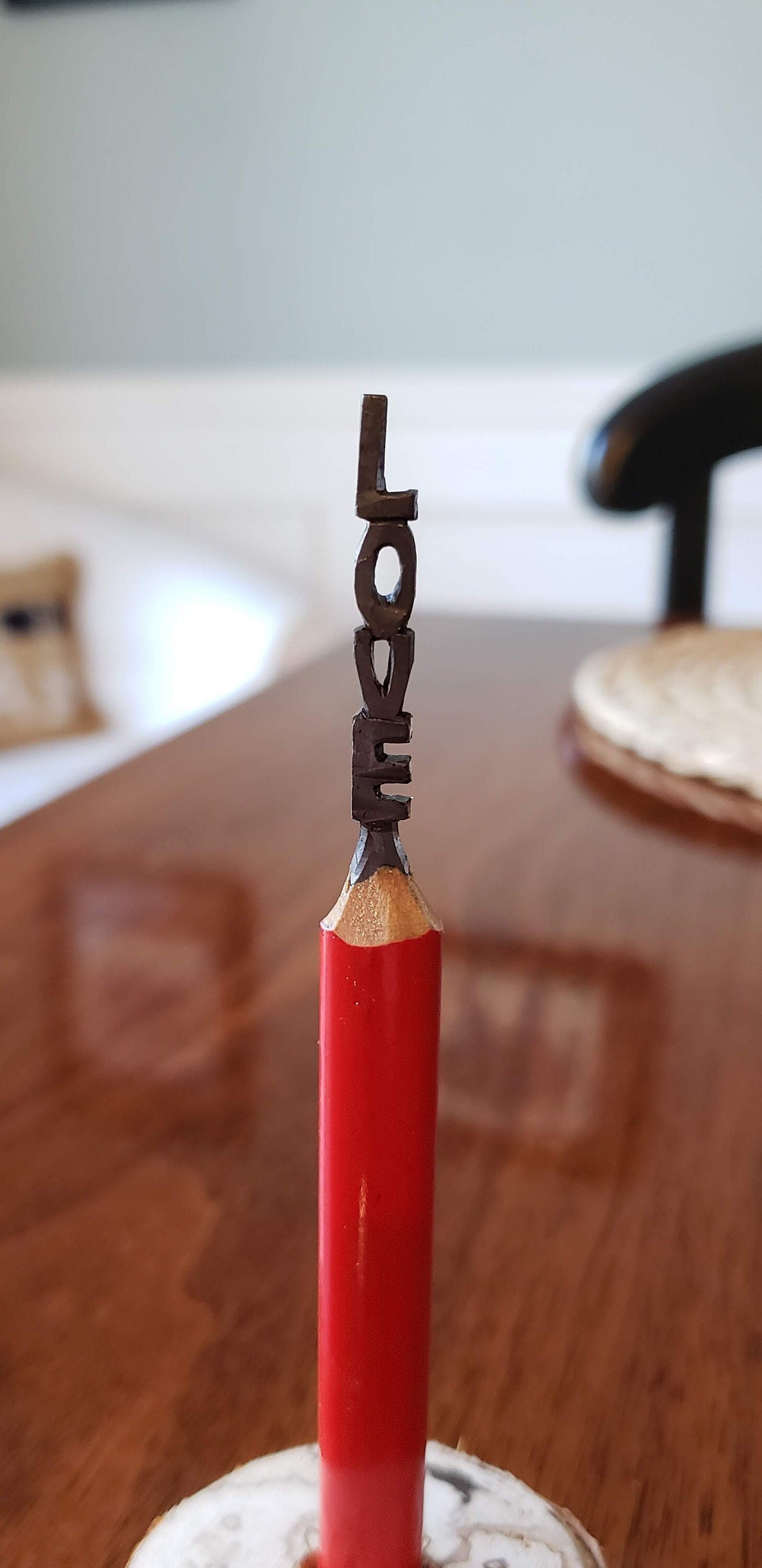 Pencil Lead Art. LOVE in a custom stand.